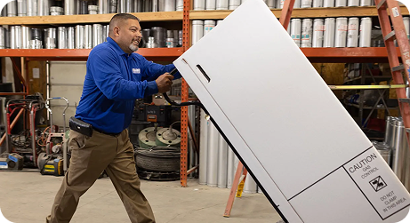 man moving a refrigerator