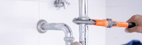 plumber-fixing-sink